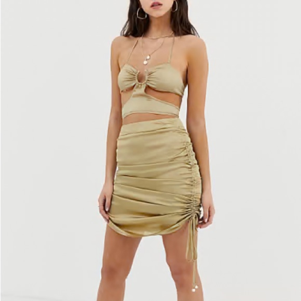 New ZYA mini skirt with ruched sides size small in champagne with pearl detail